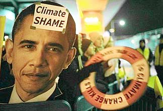 Obama's Climate Shame Demonstrators furious over the sham "Copenhagen Accord" protest outside of the Bella Center as the COP15 summit ends. Photo AFP/Olivier Morin.