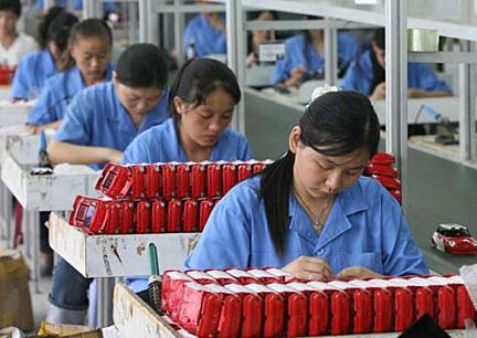 One source of Wal-Mart's vast wealth; sweatshop labor in China. Photo: AFP/Getty Images