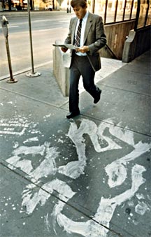 International Shadow Project 1985 - Stencil silhouette on the streets of Edmonton, Canada, August 6, 1985. Photographer unknown. Over 500 outlines of nuclear holocaust victims were painted on the sidewalks of Edmonton.