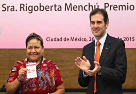 Lorenzo Córdova, president of the National Electoral Institute, presents Rigoberta Menchú Tum with her accreditation as an official election observer for Mexico's elections. Photo/INE Mexico.