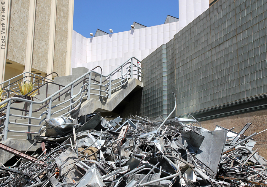 "Gutted." The Art of the Americas building on the LACMA campus, facing Wilshire Blvd.—its interior metal parts gutted and bulldozed into a gigantic heap. Photo Mark Vallen ©. April 26 2020.