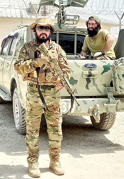 Taliban soldiers in Kabul, Afghanistan, August 2021. Fully equipped with American gear, and riding one of the 42,000 pick-up trucks and SUVs left behind courtesy of Joe Biden. Twitter photo: @AsaadHannaa