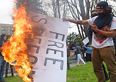Free Speech sign burned by anti-Trump protester in Berkeley, March 4, 2017.