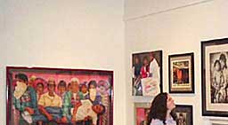 A gallery patron enjoys the exhibition