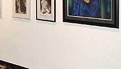 A gallery patron enjoys the exhibition