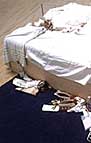 Tracy Emin's unmade bed soiled with condoms and tampons.