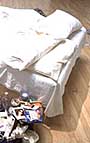 Tracy Emin's unmade bed soiled with condoms and tampons.