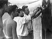 Siqueiros working on the Chouinard mural