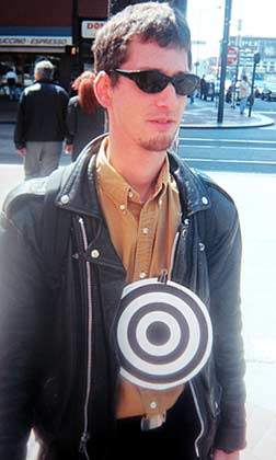 One of many protestors to wear a target symbol at San Francisco's June 5, 1999 antiwar march. Photo by Mark Vallen ©.