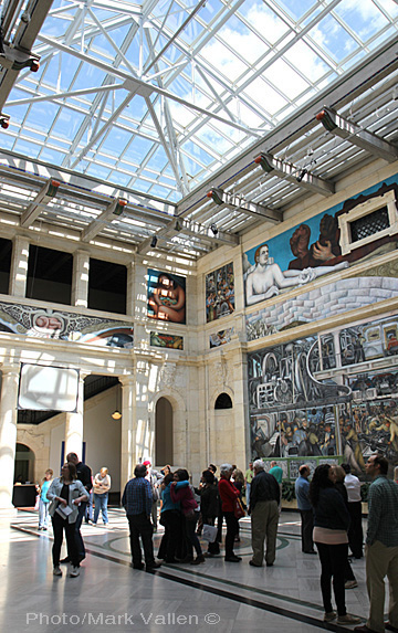 Partial view of Diego Rivera's "Detroit Industry" murals located in the Rivera Court at the Detroit Institute of Arts. The photo also shows the laminated glass skylight that illuminates the court.