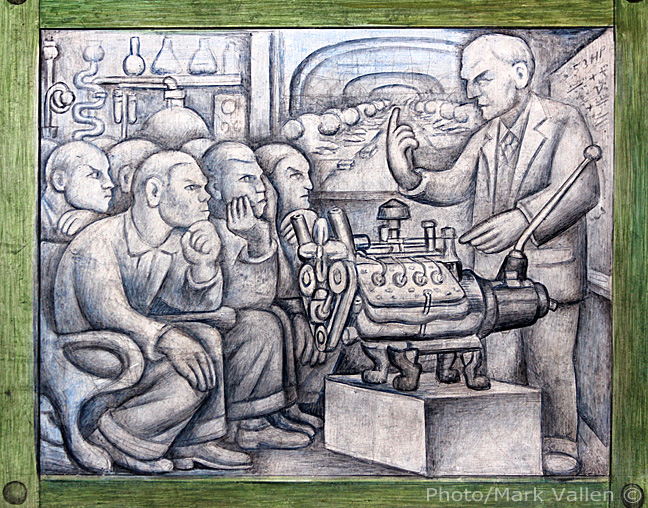 This fresco predella depicts Henry Ford giving a lecture on the V8 engine to workers.