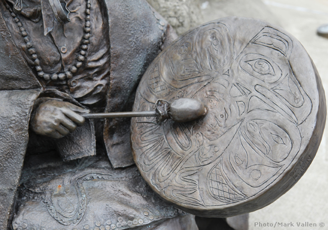   "The Rock" - Detail of indigenous woman playing her drum. Photo/Mark Vallen ©