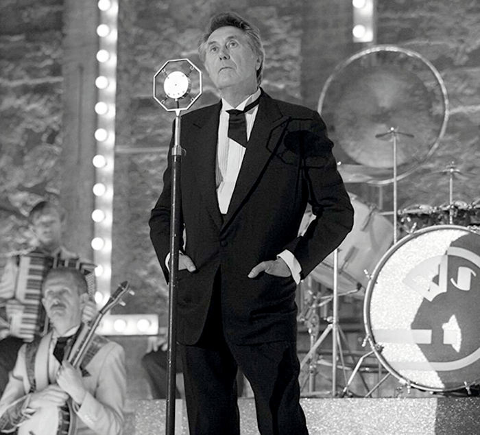 Why it's none other than Bryan Ferry, and he's singing the song "Reason or Rhyme." Photo: © Sky 1