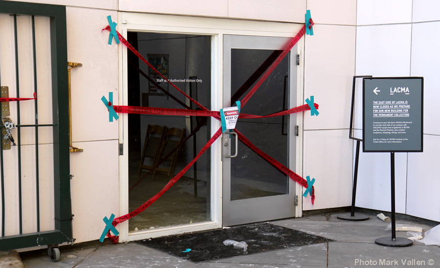 "Door to Nowhere." A taped-off door at LACMA’s gutted Art of the Americas building, served as a forlorn message concerning the ill-fated museum. Photo Mark Vallen ©. April 10 2020.